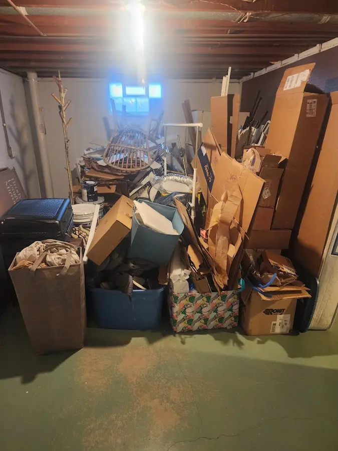 Roll-off dumpster container at job site for 2 Yard Dumpster Rental in Chesterfield